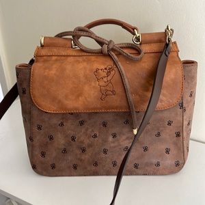 Winnie the Pooh honey bee cross body .  Super cute.